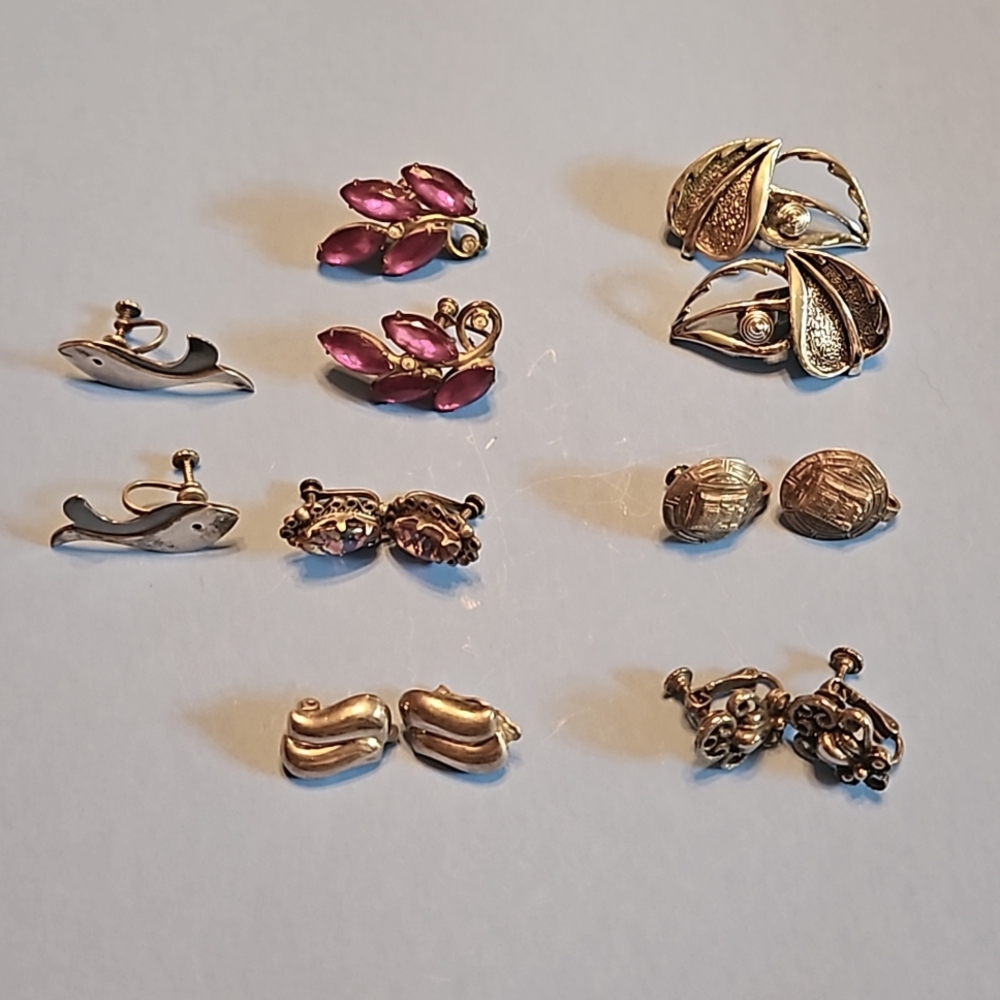 Seven pairs f vintage screw-back or clip on earrings